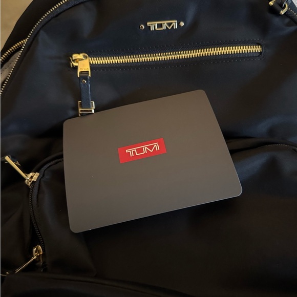 Tumi Black Backpack with Gold Accents - Picture 10 of 13